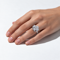 Rotating Corolla Ring — Four Sparkles in Perfect Harmony